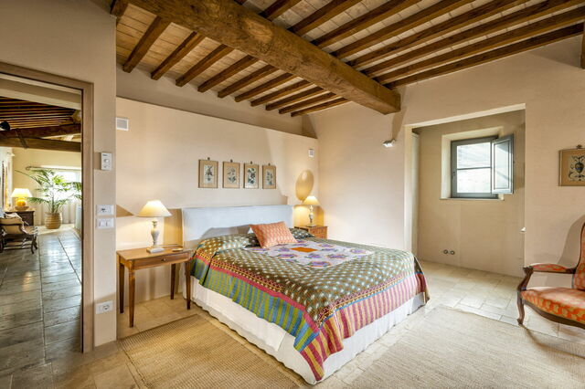 Ein Schlafzimmer im Gästehaus des Podere D'Asso