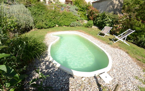 Al Colle Di Lari: Schwimmbad, Eigentum, Natürliche Landschaft, Gras, Wasser, Haus, Grundeigentum, Freizeit, Estate, Landschaft