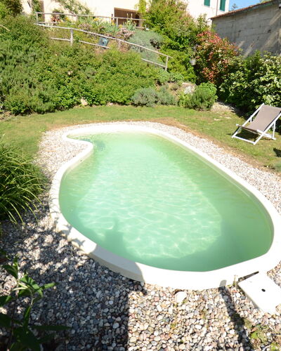 Al Colle Di Lari: Schwimmbad, Eigentum, Natürliche Landschaft, Gras, Wasser, Haus, Grundeigentum, Freizeit, Estate, Landschaft
