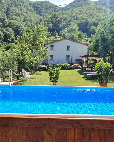Casa Irene: Wasser, Pflanze, Eigentum, Schwimmbad, Berg, Blau, Gebäude, Grün, Natur, Azurblau