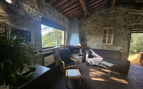 Il Nido: Wand, Möbel, Stuhl, Hütte, Steinwand, Wohnzimmer, Natürliches Material, Couch, Kaffetisch