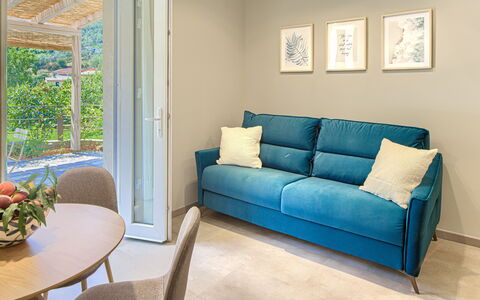 La Casa Dei Glicini - Levanto: Möbel, Couch, Pflanze, Azurblau, Tabelle, Holz, Interior Design, Wohnzimmer, Kissen, Fussboden