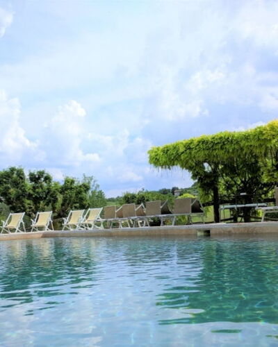 Podere della Bruciata: Schwimmbad, Gartenmöbel, Freizeit, Regenschirm, Resort, Sonnenliege, Tropen, Water Feature, Ferienort, Eco Hotel