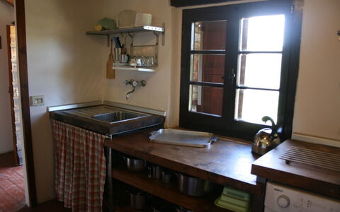 Agriturismo Bevignano: Zimmer, Eigentum, Möbel, Gebäude, Haus, Countertop, Cabinetry, Tabelle, Küche, Hartholz